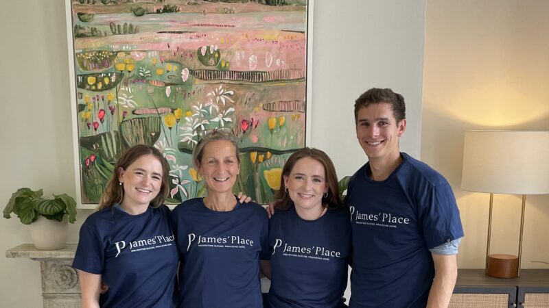 Team of people wearing James' Place tshirts