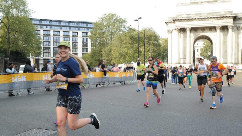 Woman running marathon in London