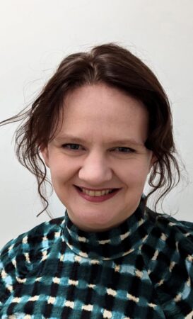 Photo of woman looking at camera