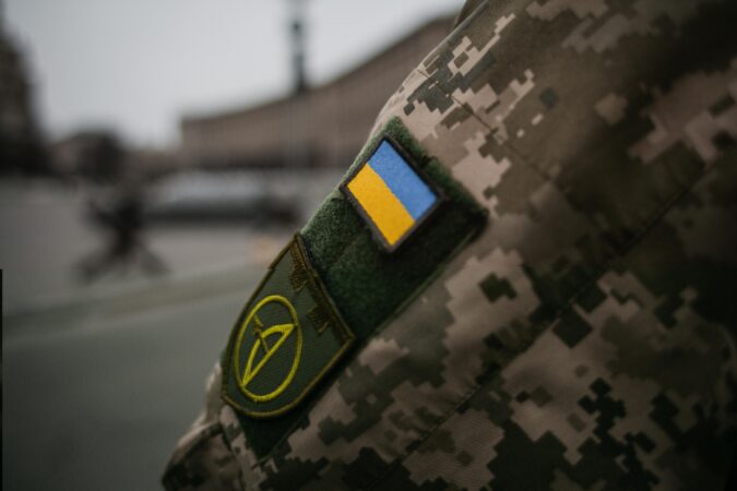 Man in army uniform with Ukraine badge