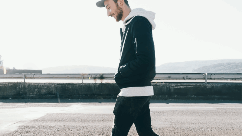 Man walking across road
