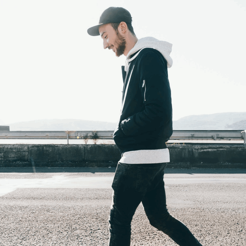 Man walking across road