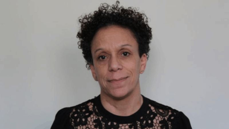 Photo of woman smiling at camera