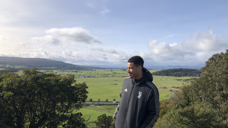 Man standing in a country landscape